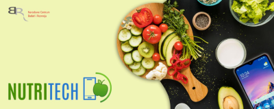 Grafika przedstawia drewnianą tace z ułożonymi na niej warzywami do tego obok stoją miseczki wypełnione przyprawami. Pod spodem napis: Nutritech