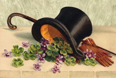 Rysunek czarnego cylindra z którego wypadają kwiaty